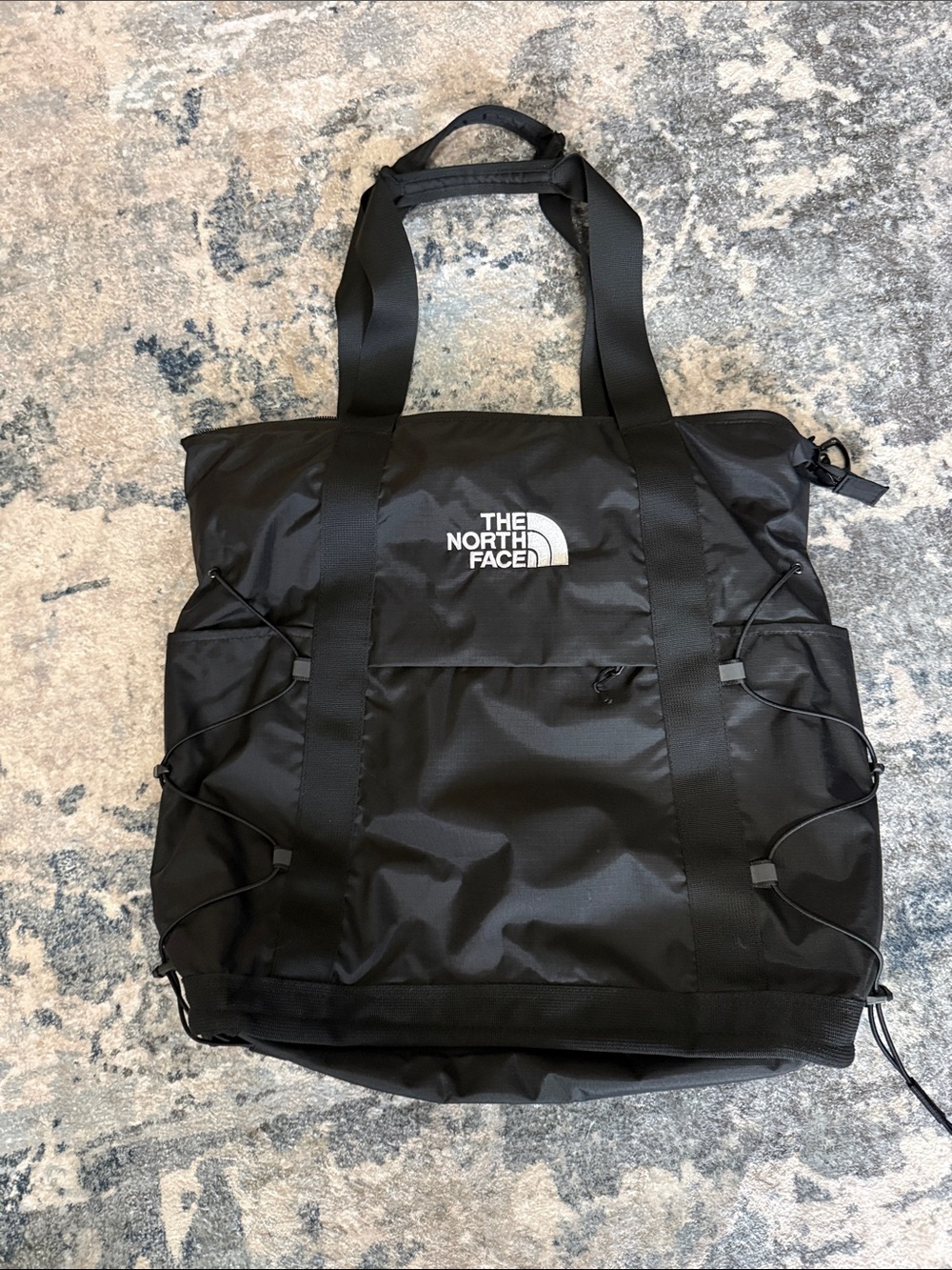 The North Face Black Duffel Tote with Bungee Side Storage